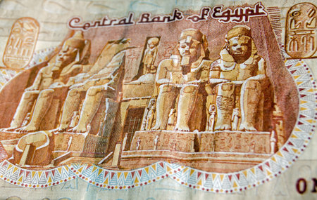 The famous Abu Simble Temple on the front of a one pound banknote from Egypt. Used banknote,...