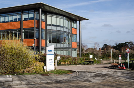 Basingstoke, UK - January 17, 2021: Exterior of the office block housing Adidas sportswear, Axians technology and Capita service companies in the Viables Business Park in Basingstoke, Hampshire.のeditorial素材