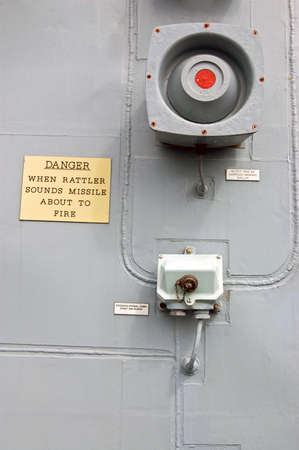 A warning alarm onboard a British Navy warship.