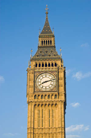 The tall clock tower at the Houses of Parliament in Westminster, London, known as Big Ben.