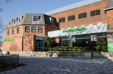 Wokingham, UK - February 28, 2021: Entrance to the Nuffield Health gym and fitness centre in the middle of Wokingham in Berkshire on a sunny spring day.のeditorial素材