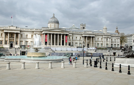 London, UK - April 21, 2021: Slightly elevated view across the landmark Trafalgar Square towards the National Gallery in central London on a chilly spring day.のeditorial素材