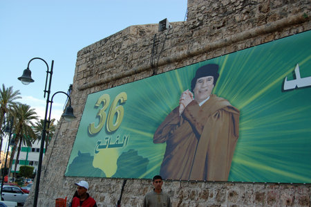 Tripoli, Libya - April 3, 2006: Celebratory poster of President Colonel Gaddafi on the wall of the Red Castle in the centre of Tripoli, Libya on a sunny afternoon.のeditorial素材