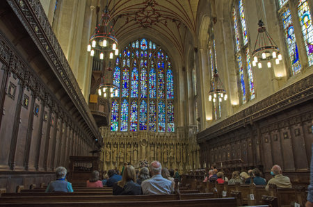 Winchester, UK - September 17, 2021: Audience members sitting in the historic Chapel of Winchester College public school ahead of a public choir practice.のeditorial素材