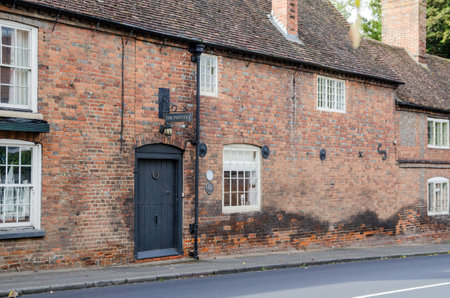 Aldermaston, UK - October 27, 2021: View of the former Aldermaston Pottery in the heart of the Berkshire village in the Autumn. The historic building has now been converted to a house.のeditorial素材