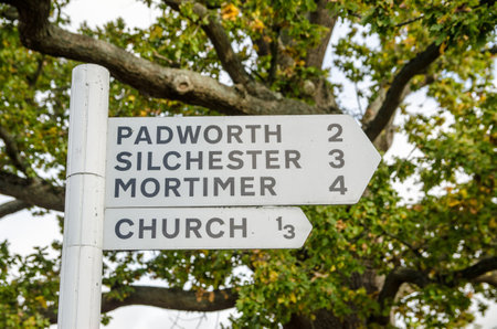 Fingerpost directing traffic to nearby villages in Aldermaston, Berkshire.の写真素材