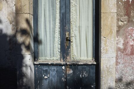 ancient window of an ancient villageの写真素材