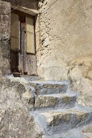 old door with scale and entranceの写真素材