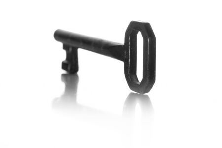 iron key for lock of a door on a totally white background and supportの写真素材