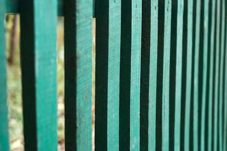 Bright green wood wooden fence gate, close up shotの写真素材