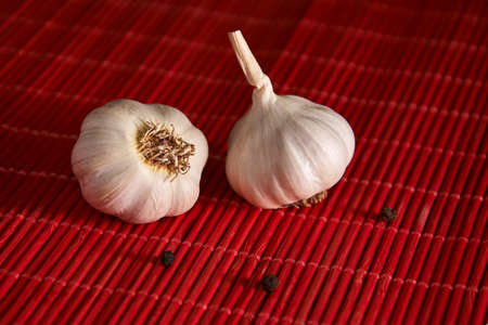Garlic and black pepper on the wooden table top. Dry Spices Mixの写真素材