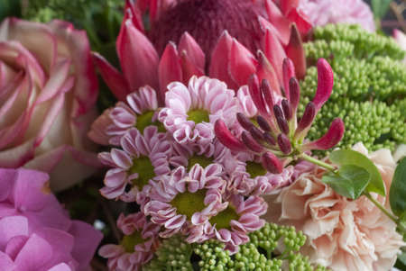 Beautiful colored wedding bouquet. With red and green colorの写真素材