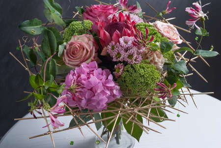 Beautiful colored wedding bouquet. With red and green color