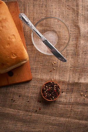 Top view of wholegrain bread on dark ructic wooden background