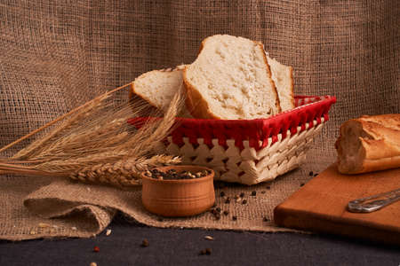 Peppercorns in a wooden bowl on table with food rustic styleの写真素材
