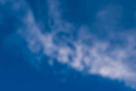 Blurred clouds, sky during in morning. Blue,white pastel heaven,soft focus lens flare sunlight. Dayの写真素材