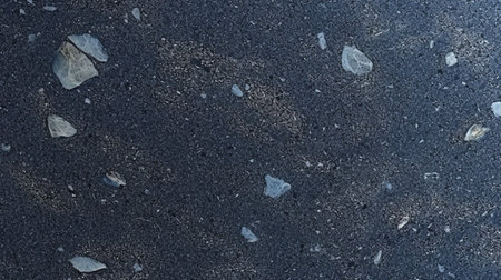 Asphalt texture with small pebbles. Abstract background and texture for design.の素材