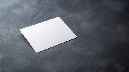 Blank business card on black background. Mockup for branding identity.の素材