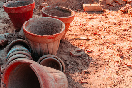 Plastic flower pots with soil on construction site, closeup of photoの写真素材
