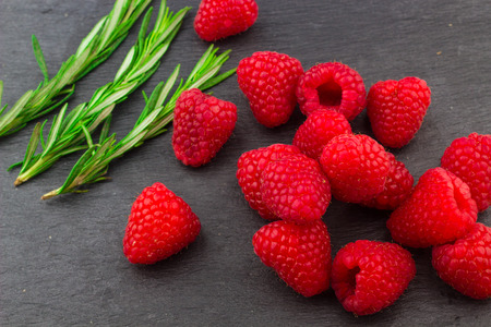 Fresh Red Raspberries on a white artistic plate / Red Fresh Raspberries on a white artistic plate...