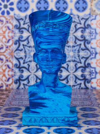 Ancient Egyptian Pharaoh Statue on colorful Artistic background / Ancient Egyptian pharaoh Statue on colorful oriental patternのeditorial素材