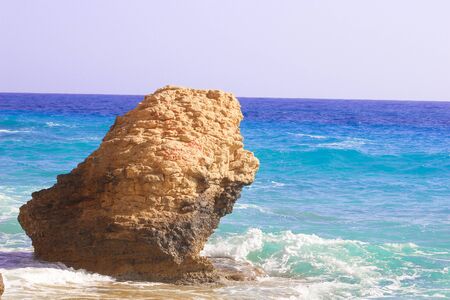 Seashore Waves and Mountain under the Sunshine in Matrouh, Egypt / View of Beautiful Seashore Waves and Majestic Mountain under the Sunshine in Matrouh, Egyptの写真素材