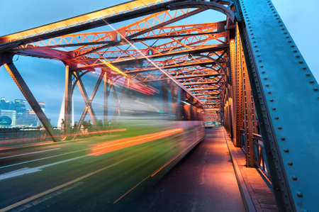 traffic through bridge with blur trail