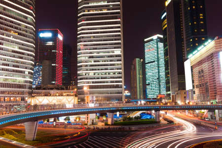 shanghai downtown at night with roundabout light trailsのeditorial素材