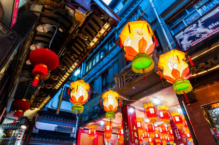 SHANGHAI - FEBRUARY 25: Yuyuan's lanterns and shops.Shanghai, February 25, 2013. Shanghai is the largest city by population in the world with 23 million as in 2010.のeditorial素材