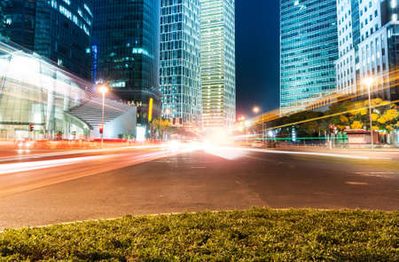The light trails on the modern building background in shanghai china.のeditorial素材