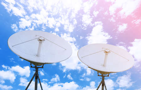 satellite dish antennas under skyの写真素材
