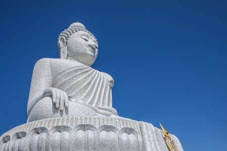 big buddha image made from white marbleの写真素材
