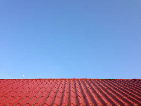 red roof and blueskyの写真素材