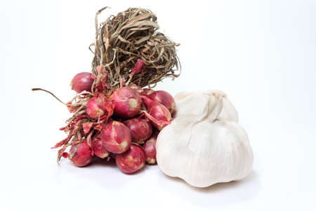 shallots and garlic on the white backgroundの写真素材