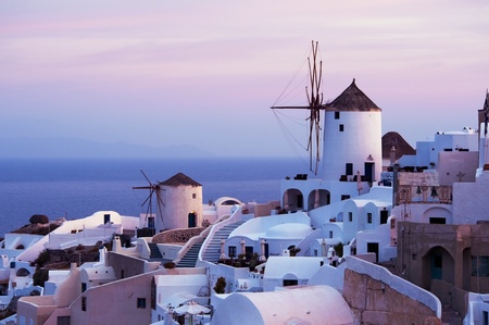 Two windmills in the Oia village, Santorini, Greeceの写真素材