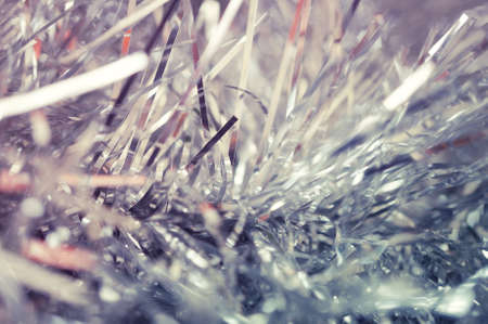 An abstract futuristic Christmas and New Year Background with a tinsel.