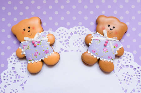 Polka-dot background with honey-cake bears and a napkinの写真素材
