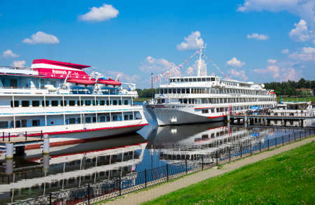 UGLICH, RUSSIA - JULY 03, 2016: Two cruise ships Konstantin Fedin and Viking Akun are at the pier of Uglich. Uglich is a historic town in Yaroslavl Oblast, Russia, which stands on the Volga River.のeditorial素材