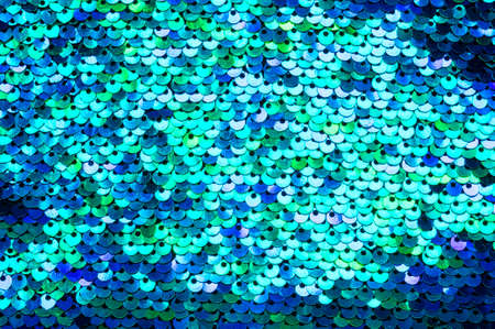 Beautiful iridescent sequins texture, which is looking like fish scales.
