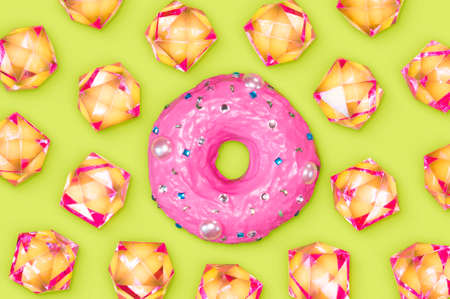 A photo of a donut with lots of rhinestones around it.の写真素材