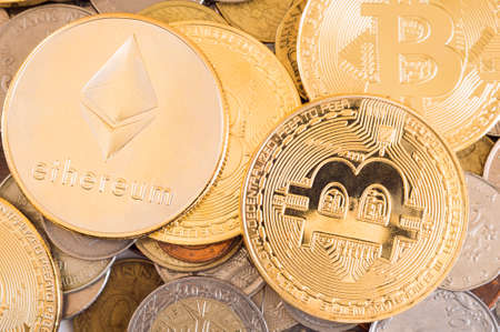 Ethereum, bitcoins and different types of old and new coins from many countries.