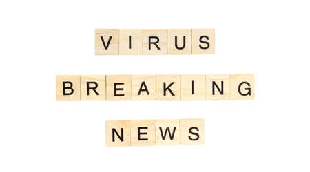The words "Virus Breaking News" spelt out with letter tiles on the white backgroundの写真素材
