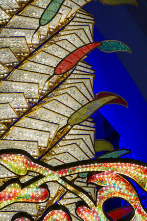 Close-up of one of the exquisite chandeliers inside the Sheikh Zayed Grand Mosque, adorned with millions of Swarovski crystals.の写真素材