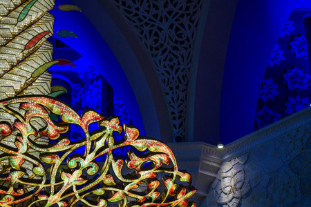 Close-up of one of the exquisite chandeliers inside the Sheikh Zayed Grand Mosque, adorned with millions of Swarovski crystals.の写真素材