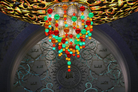 Close-up of one of the exquisite chandeliers inside the Sheikh Zayed Grand Mosque, adorned with millions of Swarovski crystals.の写真素材