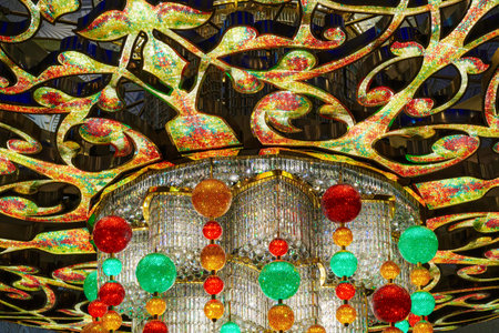 Close-up of one of the exquisite chandeliers inside the Sheikh Zayed Grand Mosque, adorned with millions of Swarovski crystals.の写真素材