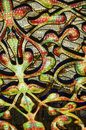 Close-up of one of the exquisite chandeliers inside the Sheikh Zayed Grand Mosque, adorned with millions of Swarovski crystals.の写真素材