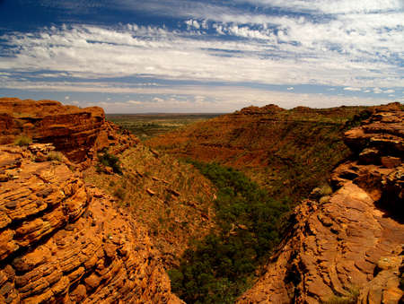 Australian Kings Canyon with typical red rocks and blue skyの写真素材