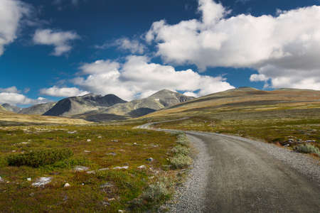 Rondane National Park with road and mountainsの写真素材
