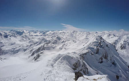 Mountain with ridge and snow in winter, HochfÃ¼gen, Austria, blue skyの写真素材